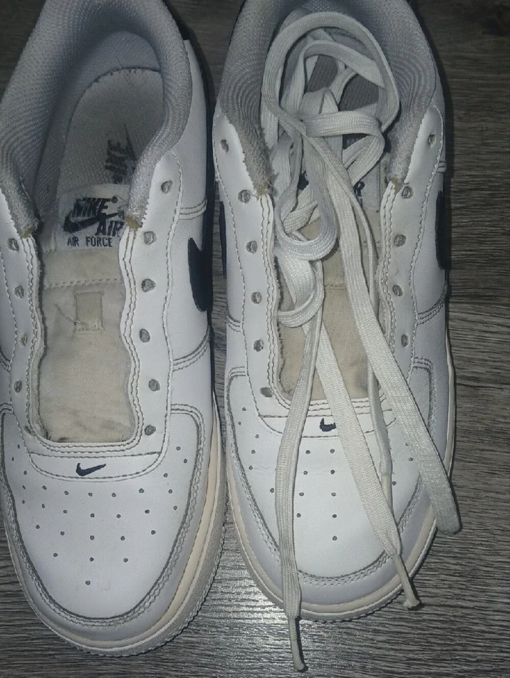 Nike Men’s White Sneakers with Black Swoosh